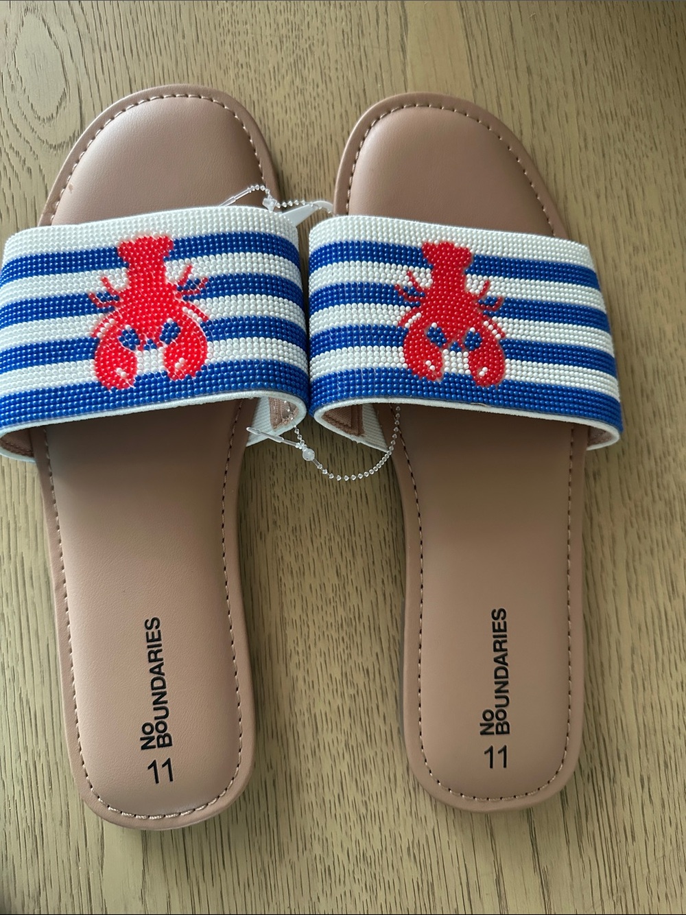 No Boundaries Tan Slide Sandals with Blue & White Straps and Red Lobster Accent